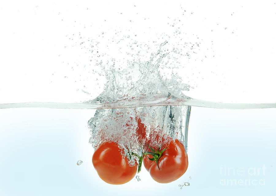 Three Tomatoes Splashing In Water #1 Photograph by Leonello Calvetti/science Photo Library