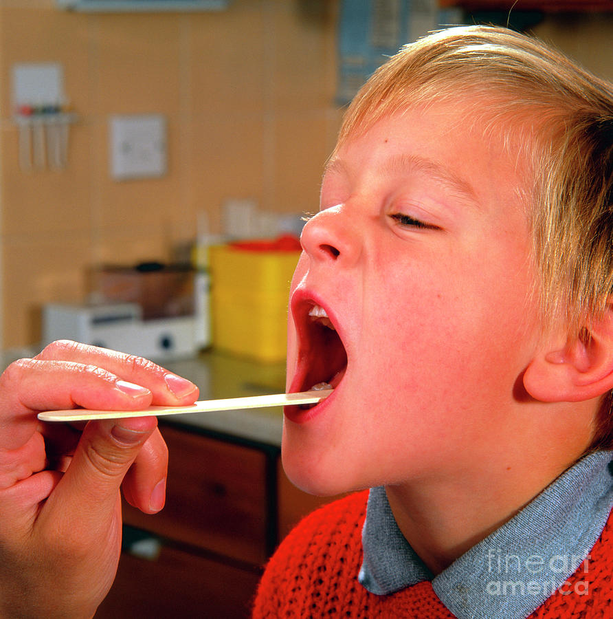 Throat Examination Of Young Boy #1 Photograph by Saturn Stills