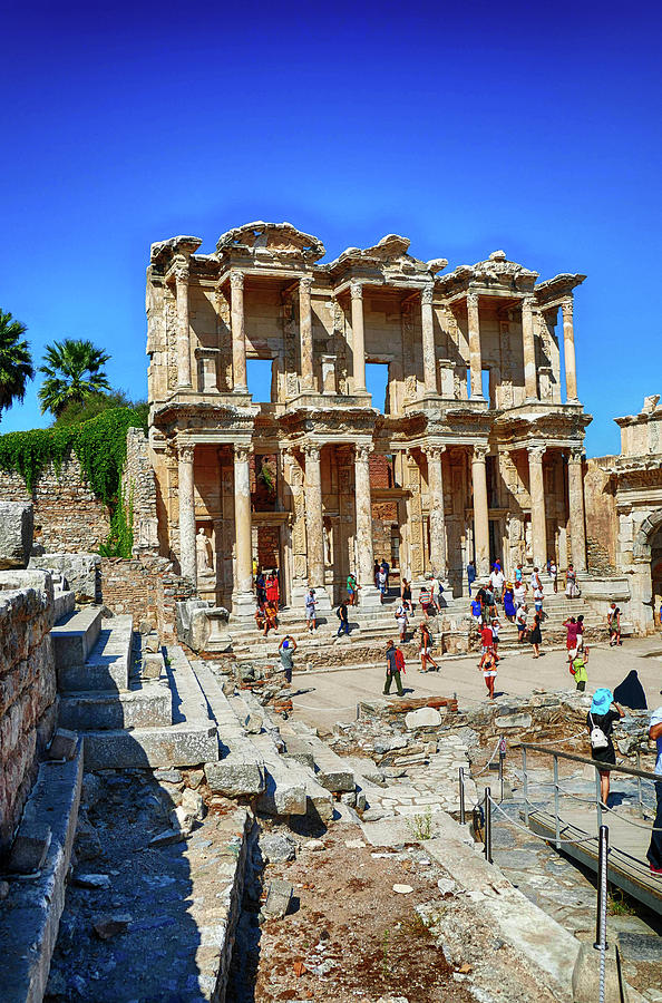 Tourists explore the Library of Celsus   #1 Photograph by Steve Estvanik