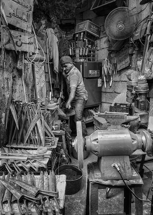Man Photograph - Traditional Bladesmithing #1 by Bashar Alsofey
