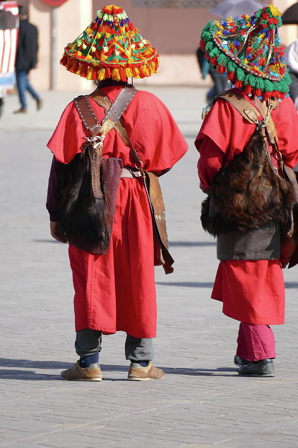 Traditional water seller in red uniform #1 Photograph by Steve Estvanik