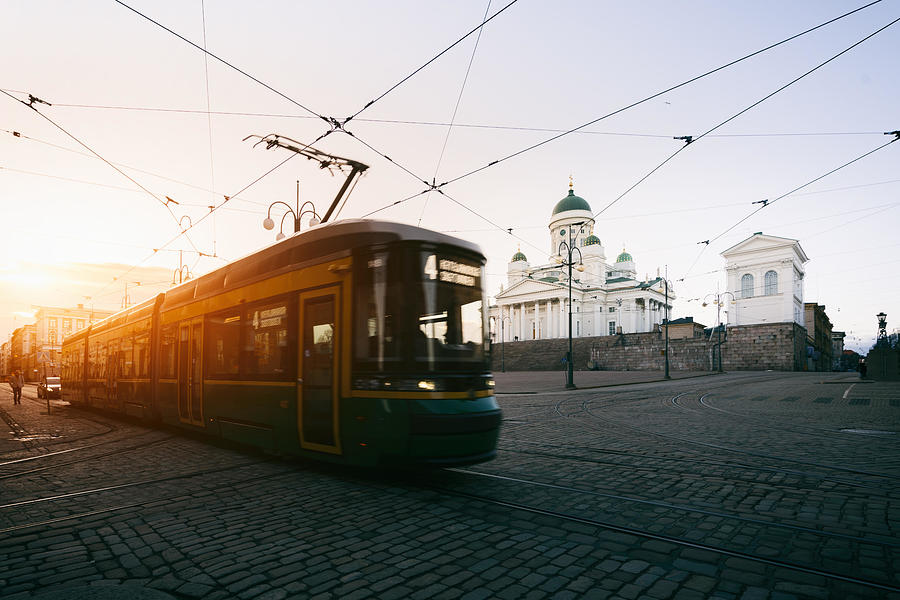 Transportation Photograph - Tram Passing Helsinki Senate Square #1 by Prasit Rodphan