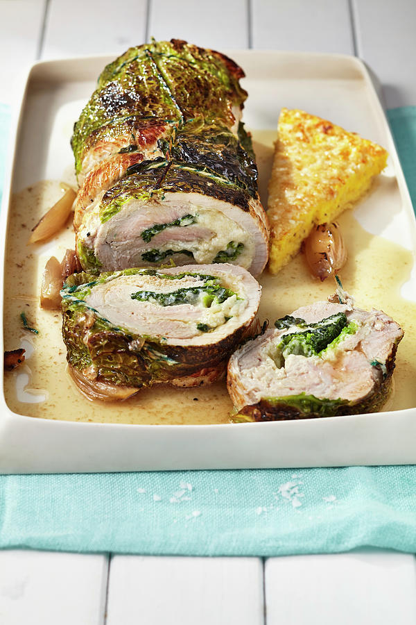 Turkey Roulade Filled With Savoy Cabbage, Served With Polenta Slices And A Cider Sauce #1 Photograph by Stockfood Studios /  Ulrike Holsten