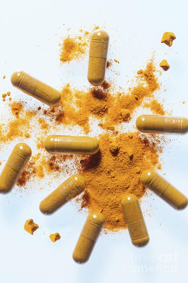 Turmeric Supplement Capsules And Powder #1 Photograph by Cristina Pedrazzini/science Photo Library