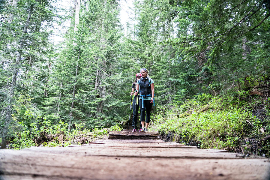 Two Female Hikers On A Trail In The Mt. Baker Wilderness Photograph by