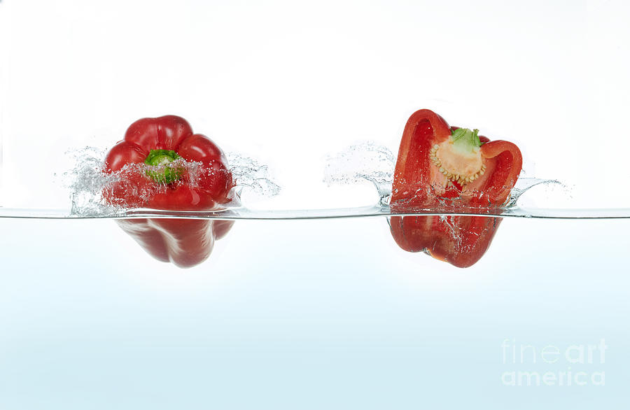 Two Red Peppers Splashing In Water #1 Photograph by Leonello Calvetti/science Photo Library