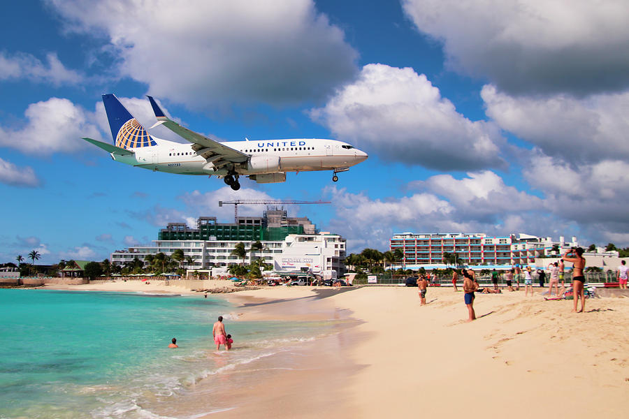 United Airlines 737 landing at St. Maarten Airport #1 Photograph by David Gleeson