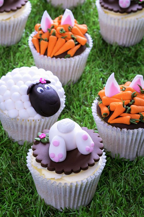 Various Easter Cupcakes On A Grass Surface #1 Photograph by Adrian Britton
