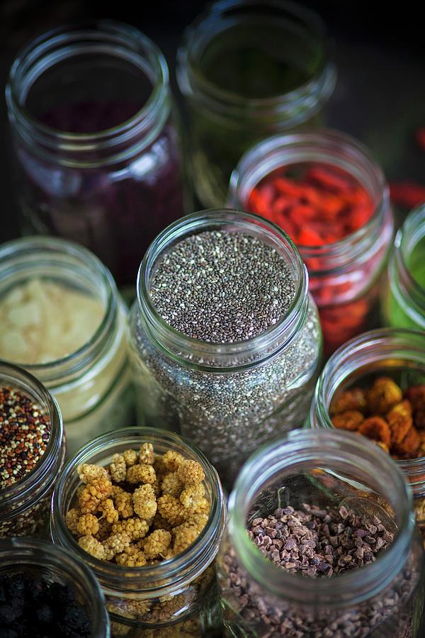 Various Ingredients In Screw Top Jars For Superfood Recipes #1 Photograph by Eising Studio