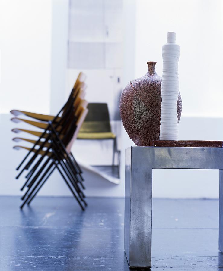 Various Pieces Of Furniture And Accessories Arranged Artistically #1 Photograph by Matteo Manduzio