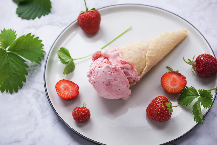 Vegan Strawberry Ice Cream In A Waffle Cone #1 Photograph by Kati Neudert