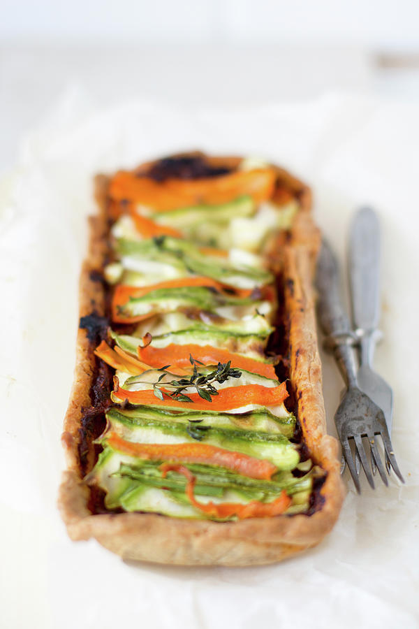 Vegetable Color Spiral Tart With Zucchini, Carrots, White Cheese And Tomato Pesto #1 Photograph by Lana Konat