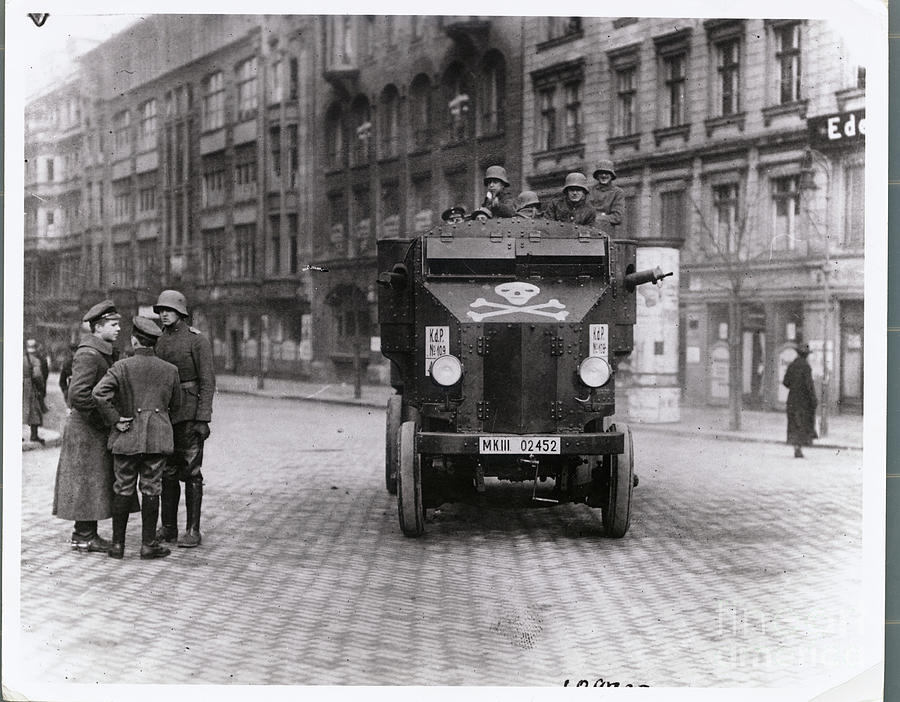 View Of Soldiers Standing In Street #1 Photograph by Bettmann