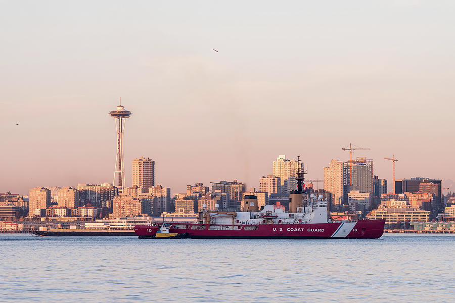 Views Of A Coast Guard Boat In Elliott Bay, Seattle Bay, With Sunset Light Over Downtown Skyscrapers Photograph
