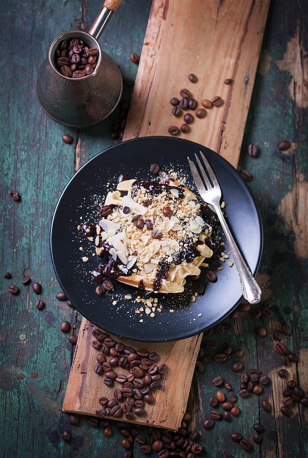 Waffles With A Chocolate And Coffee Sauce, Almonds And Hazelnuts #1 Photograph by Valeria Aksakova