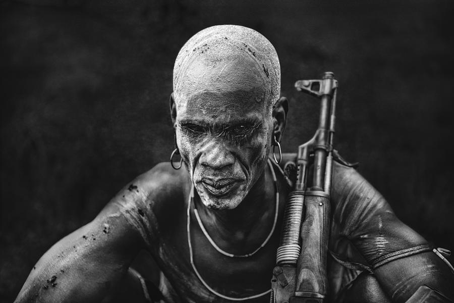 Ethiopia Photograph - Warrior,mursi Tribe #1 by Svetlin Yosifov