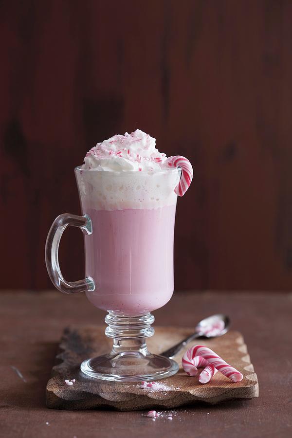White Hot Chocolate With Candy Cane #1 Photograph by Olga Miltsova