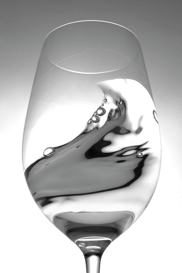 White Wine In A Glass With A Wave #1 Photograph by Peter Garten