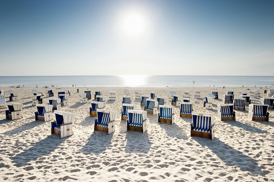 Wicker Chairs On Beach #1 Photograph by Jorg Greuel