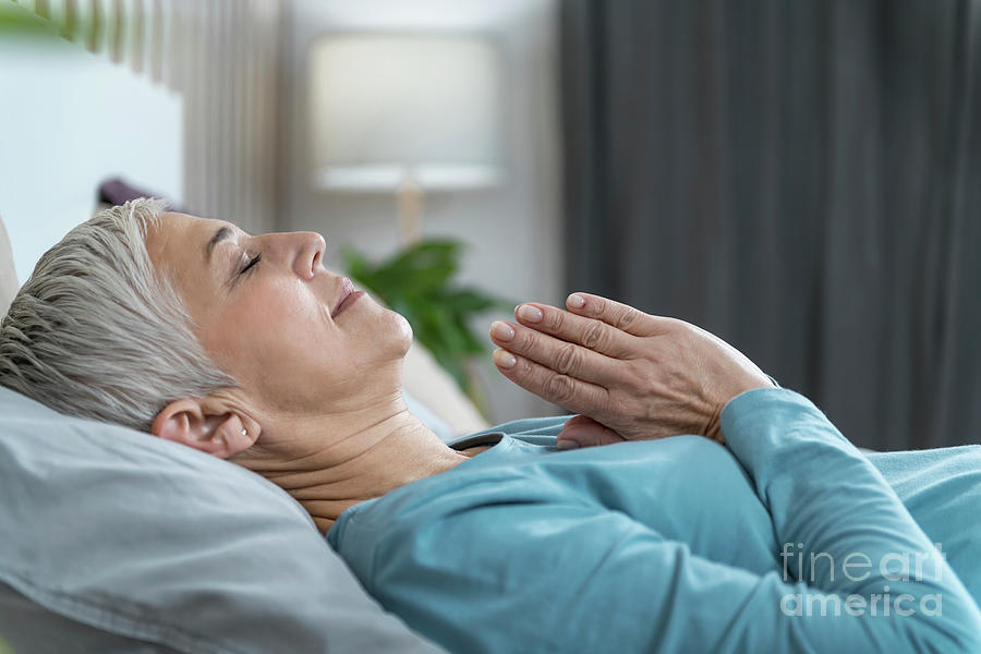 Woman Lying In Bed Meditating Photograph By Microgen Imagesscience Photo Library Pixels