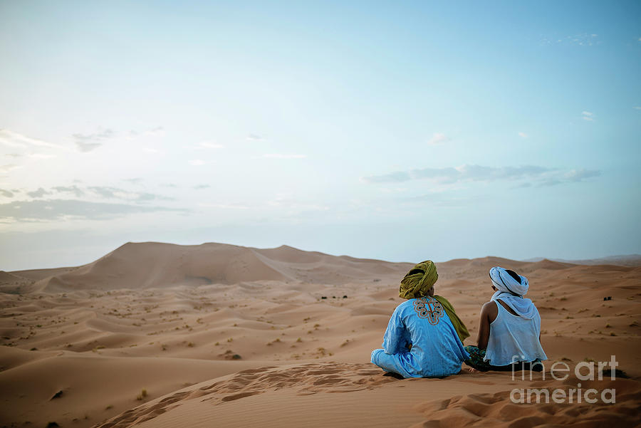 Woman Sitting In The Desert With Berber #1 Photograph by Westend61