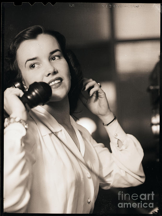 Woman Talking On Telephone #1 Photograph by Bettmann