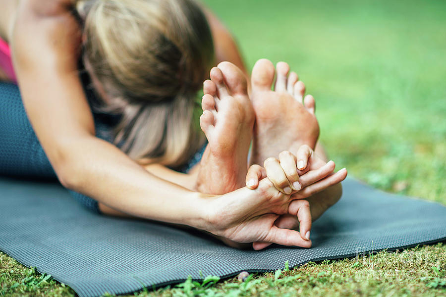 Premium Photo  Closeup of a girl stretching to touch her toes