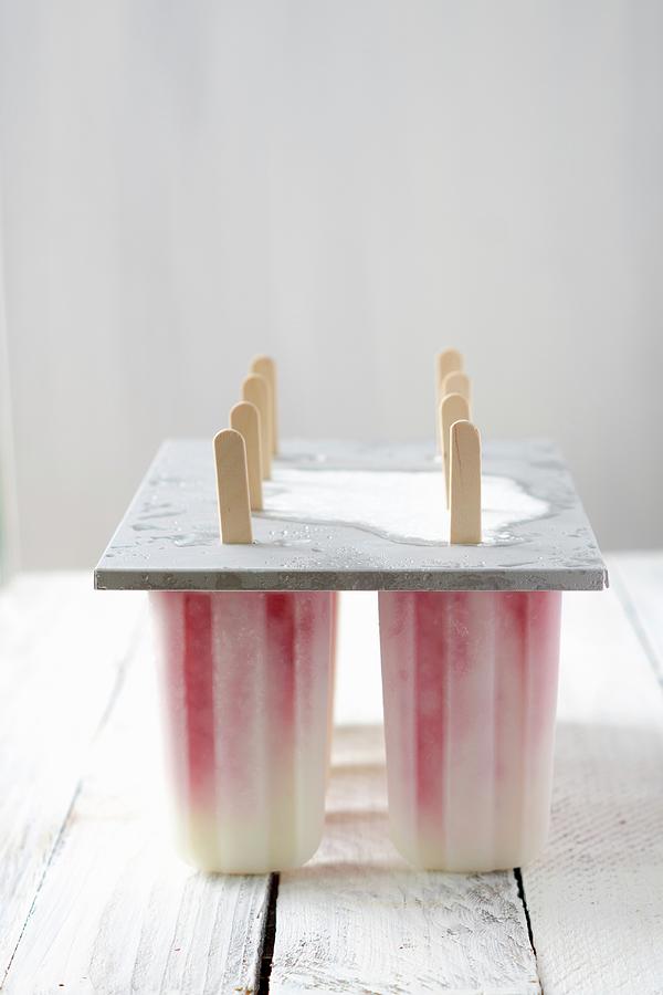 Yoghurt Ice Lollies With Strawberry Pure #1 Photograph by Saskia In Der Au