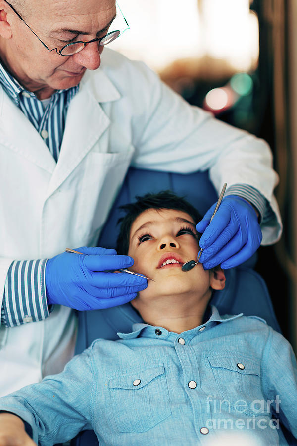 Young Boy Having Dental Check-up #1 Photograph by Microgen Images/science Photo Library