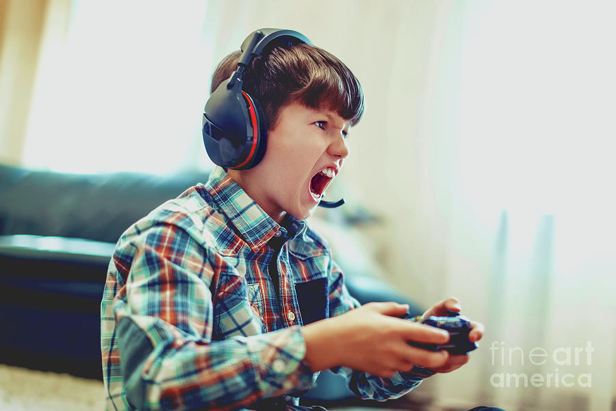 Young Boy Playing Video Game #1 Photograph by Sakkmesterke/science Photo Library