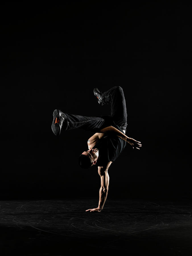 Young Male Breakdancer Balancing On One #1 Photograph by Thomas Barwick