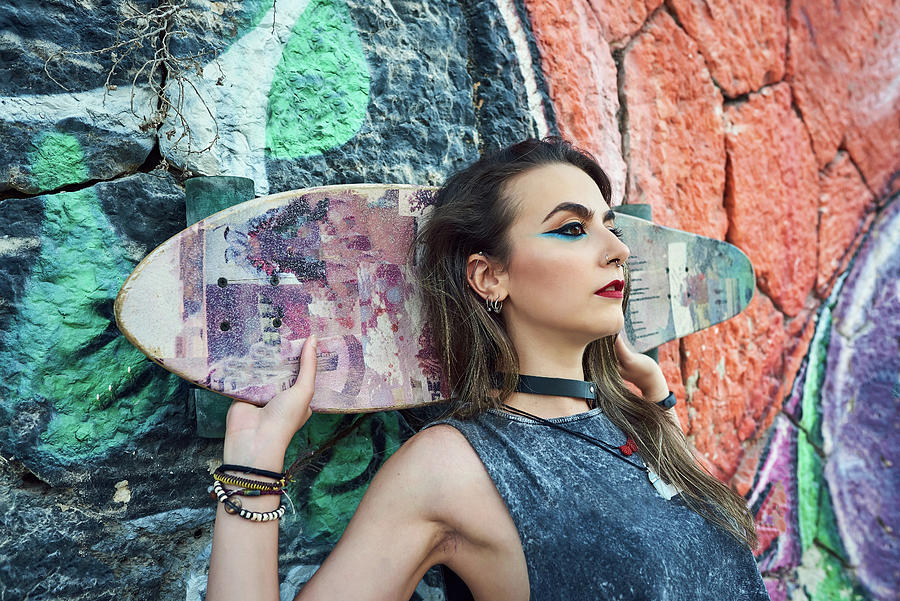 Sunset Photograph - Young Woman With Urban Style, She Poses With A Long Board. #1 by Cavan Images