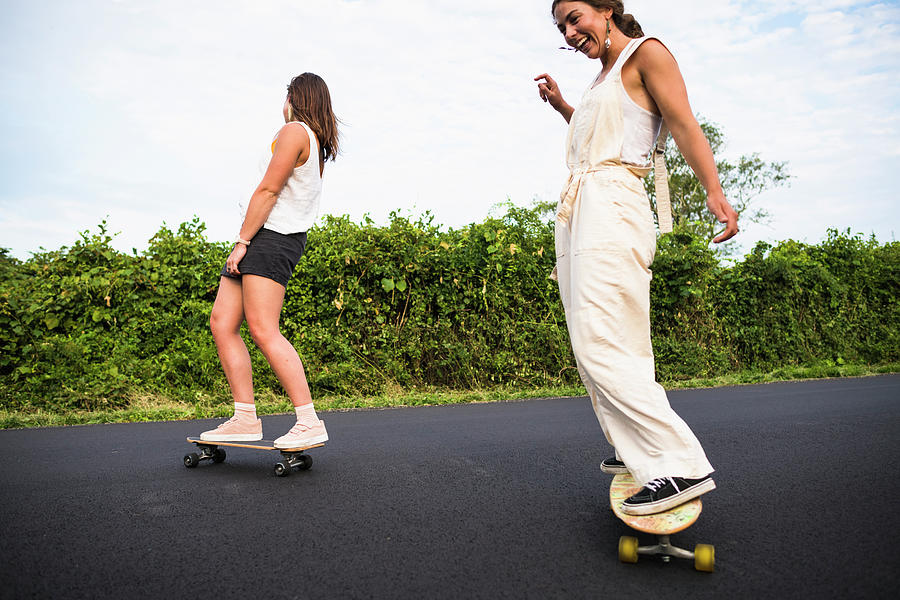 Nature Photograph - Young Women Skateboarding In Summer #1 by Cavan Images