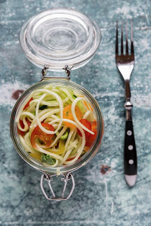 Zoodles zucchini Noodles In A Glass Jar With Tomatoes And Basil #1 Photograph by Sandra Rsch