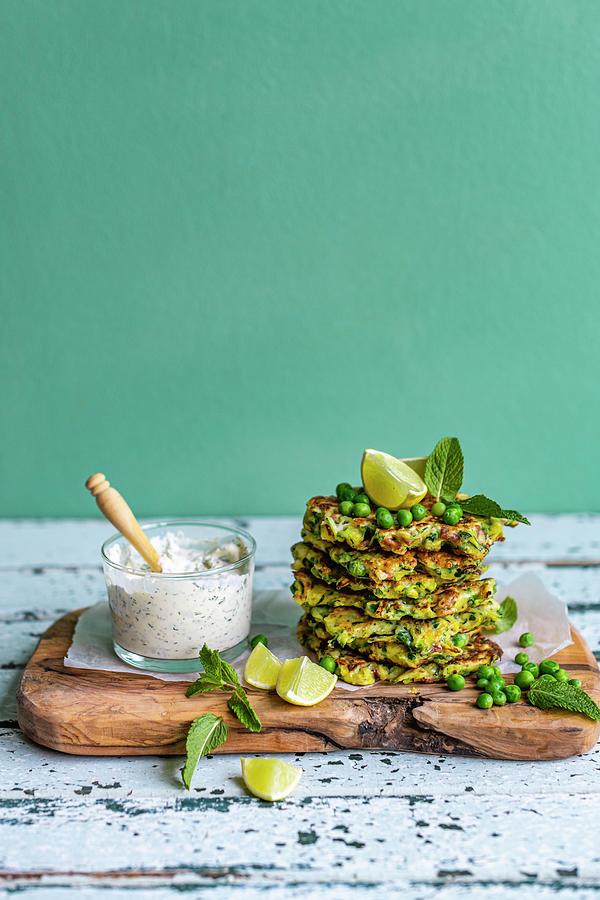 Zucchini Pea Fritter With Feta And Green Godess Dressing #1 Photograph by Hein Van Tonder