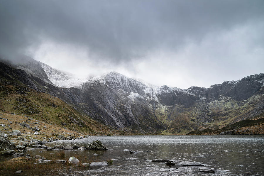 Winter Photograph - Beautiful moody Winter landscape image of Llyn Idwal and snowcap #10 by Matthew Gibson