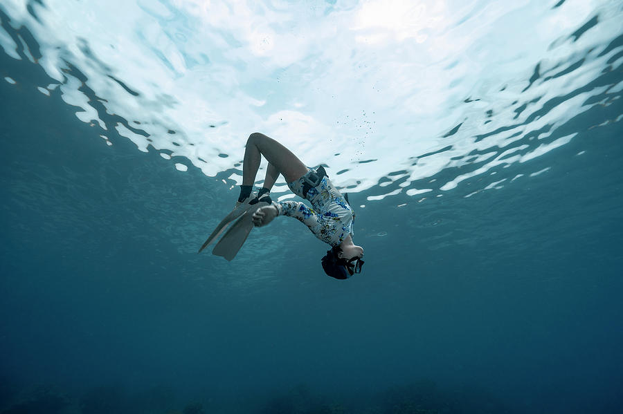 Freediver In The Clear Waters Of The Andaman Sea In Thailand Photograph ...