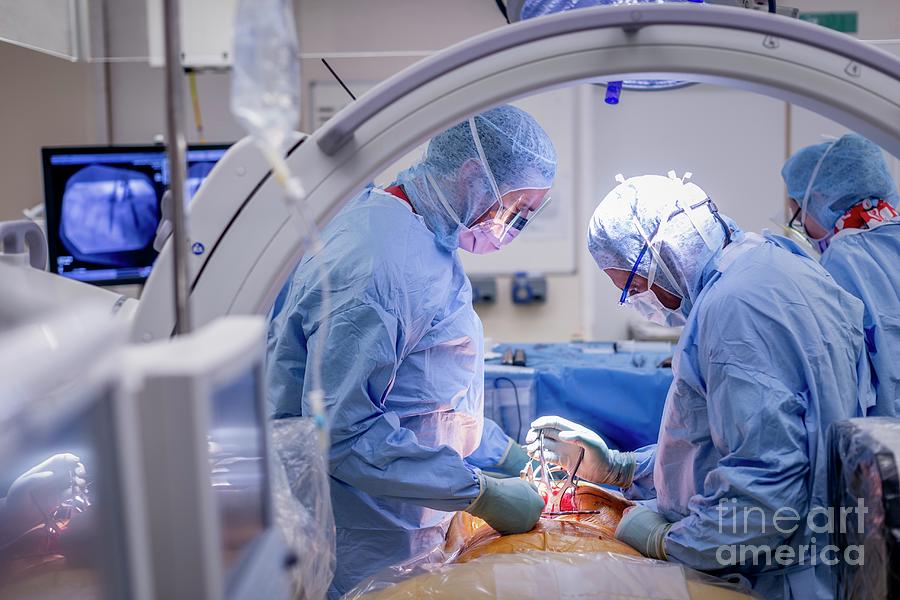 Spinal Surgeons Performing An Operation 10 Photograph by Jim Varney