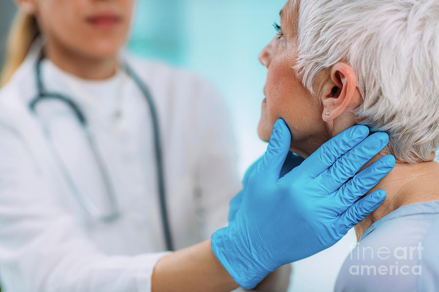 Doctor Examining A Senior Womans Neck #11 Photograph by Microgen Images/science Photo Library