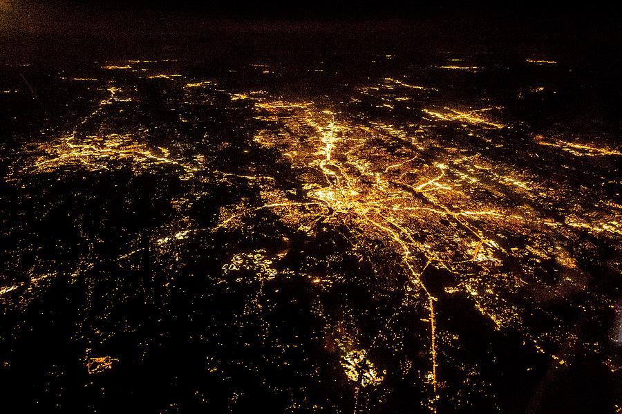 Flying at night over cities below #11 Photograph by Alex Grichenko