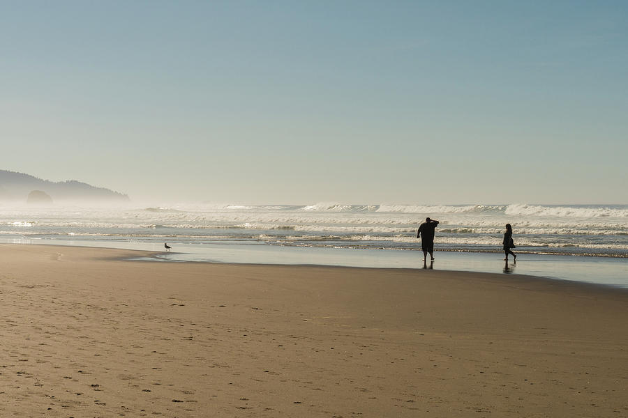 Tourists And Locals Enjoying The Sun At Cannon Beach, Oregon, Uscannon Beach, Oregon, Usa - October Photograph