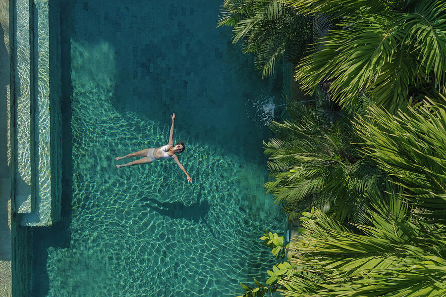 Nature Photograph - Aerial View Of Woman In Pool #12 by Cavan Images / Konstantin Trubavin