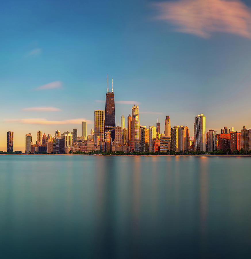 Chicago skyline at sunset viewed from North Avenue Beach Photograph by
