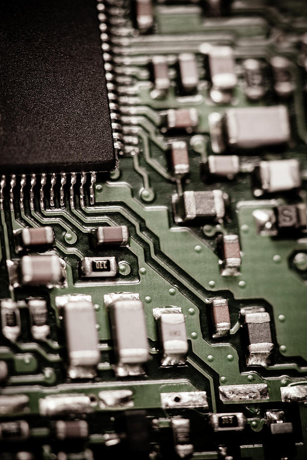 Close-up Of A Circuit Board #12 Photograph by Nicholas Rigg