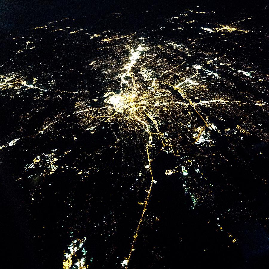 Flying at night over cities below #12 Photograph by Alex Grichenko