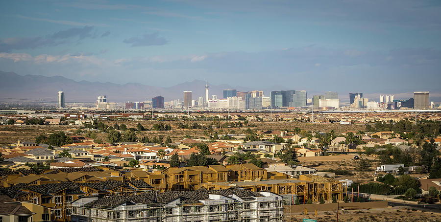 Las vegas city surrounded by red rock mountains and valley of fi #12 Photograph by Alex Grichenko