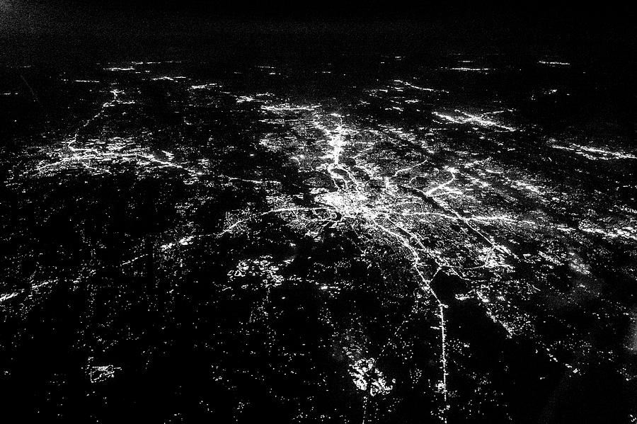 Flying at night over cities below #14 Photograph by Alex Grichenko