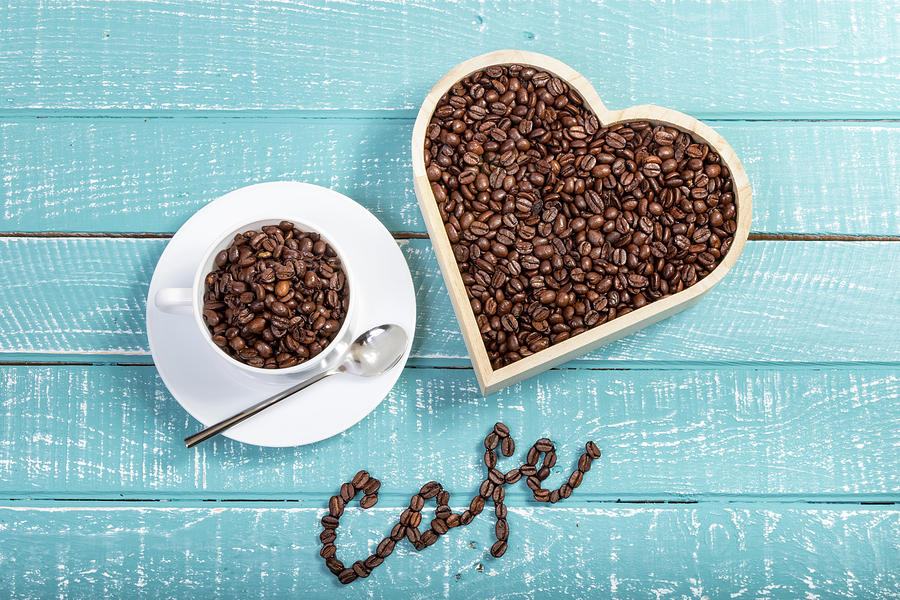 Coffee on a blue weathered table by Ben Gingell Coffee on a blue weathered table by Ben Gingell