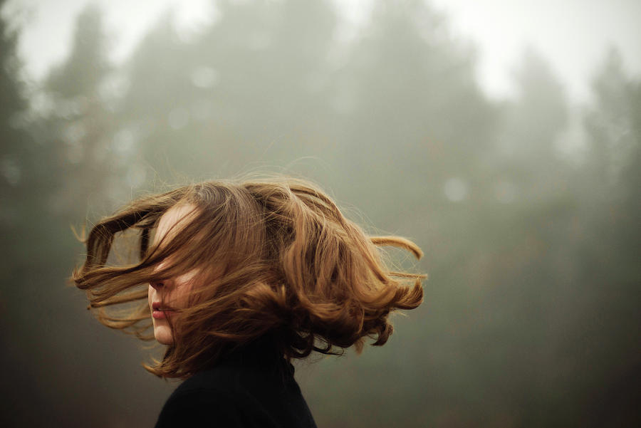 Woman Standing By Forest In Foggy Weather Photograph by Cavan Images ...