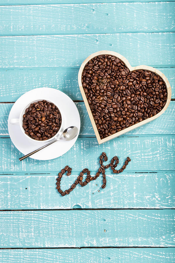 Coffee on a blue weathered table by Ben Gingell Coffee on a blue weathered table by Ben Gingell